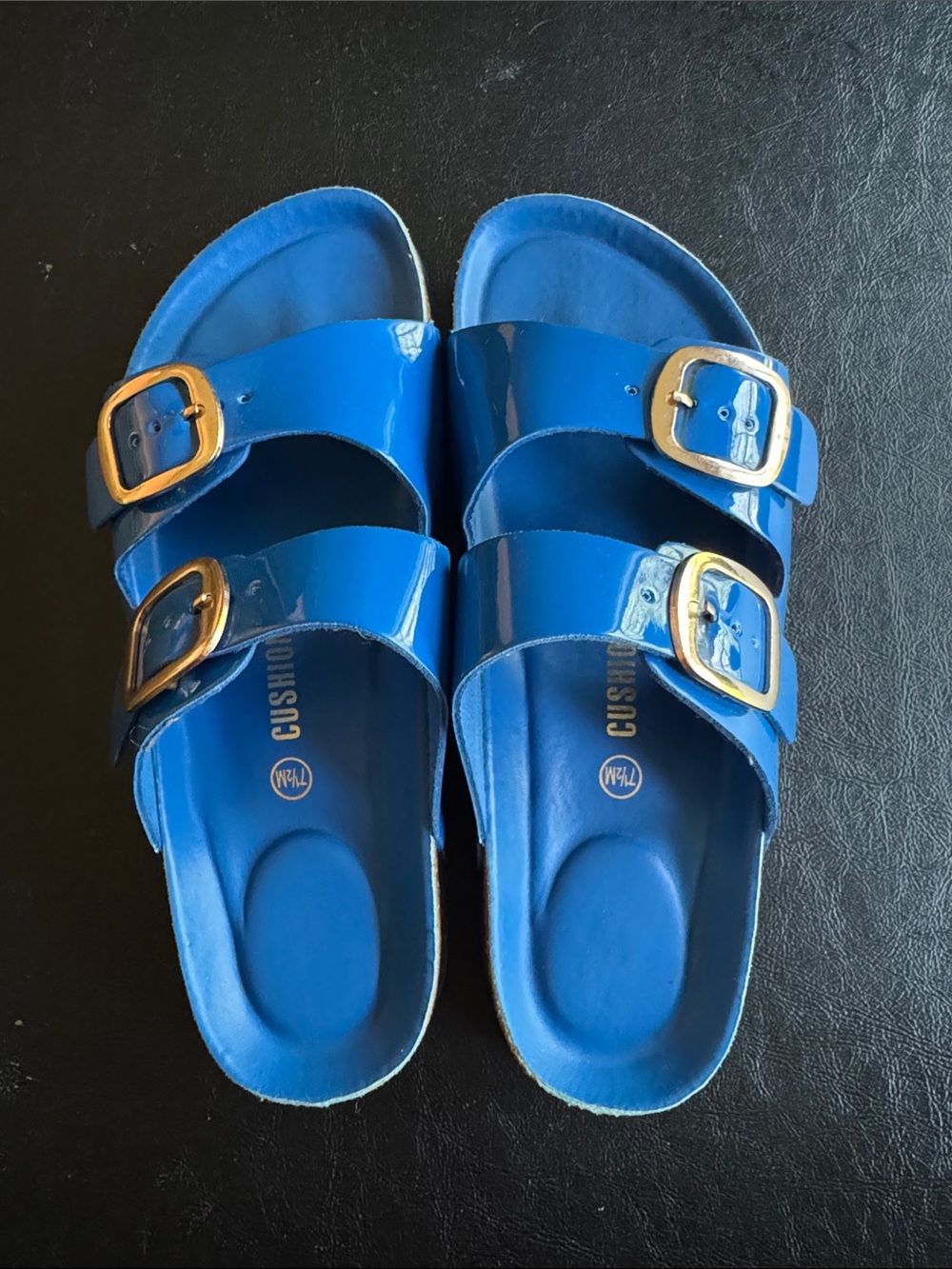 Blue double buckle Cushionaire slip-ons